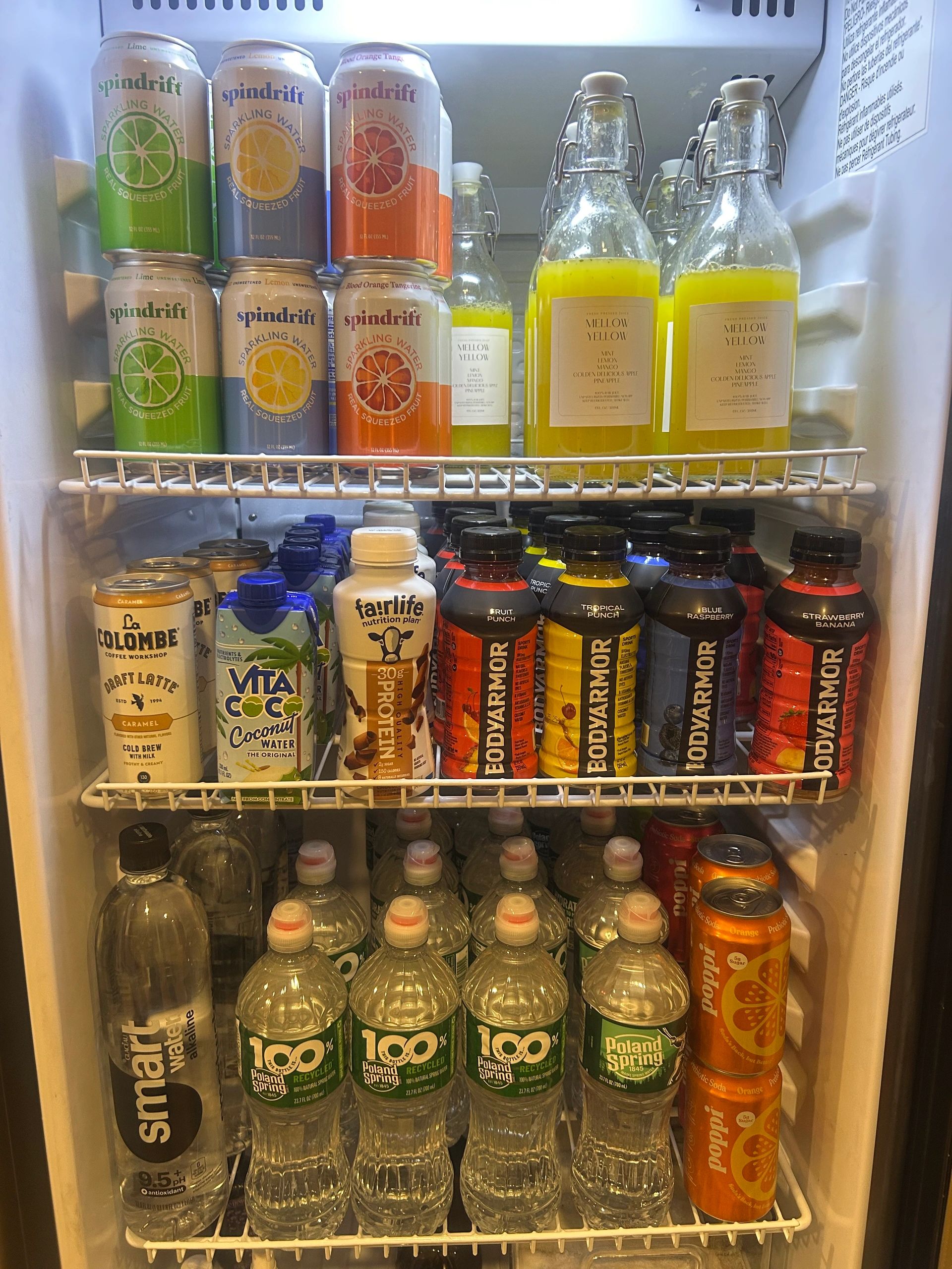 Stocked fridge with beverages